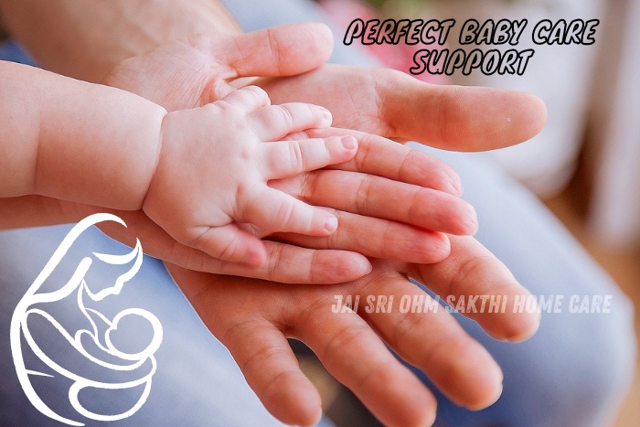 Close-up of an adult's hand gently holding a baby's hand, symbolizing the perfect baby care support provided by Jai Sri Ohm Sakthi Home Care in Coimbatore, ensuring safety and comfort for the youngest members of your family