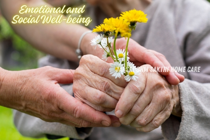 Close-up of a caregiver holding an elderly person's hand with flowers, emphasizing emotional and social well-being through compassionate elderly care services by Jai Sri Ohm Sakthi Home Care in Coimbatore