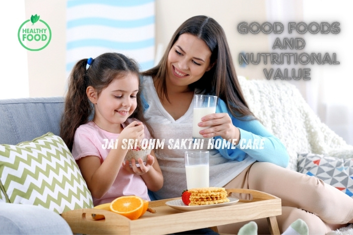 A smiling caregiver and child enjoy a healthy breakfast with milk, fruits, and waffles at Jai Sri Ohm Sakthi Home Care
